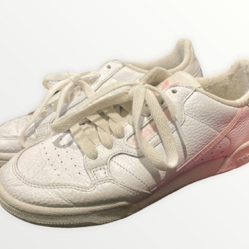 Pink adidas continentals